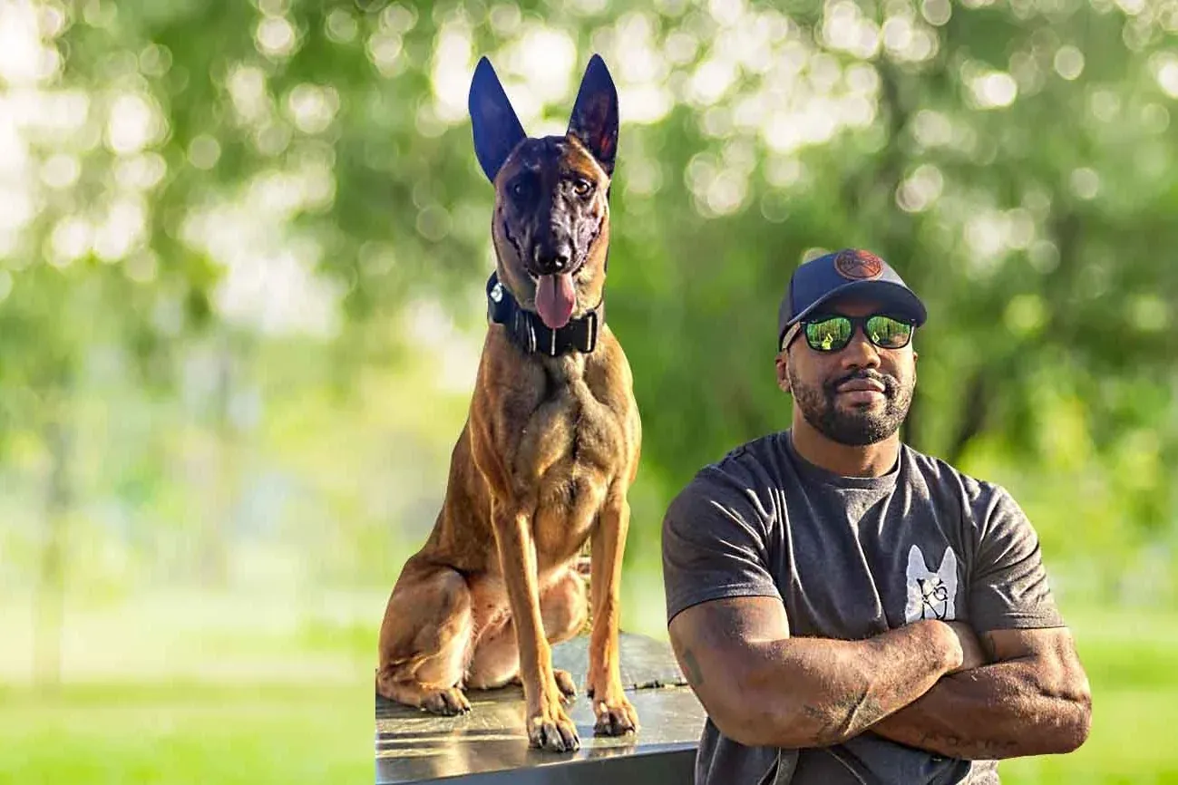 Cameron Boyd, K9aholics founder, with his Belgian Malinois