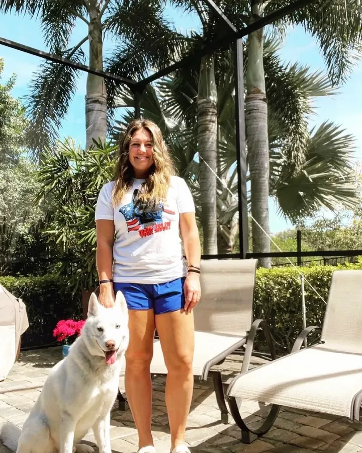 K9aholics trainer with a white husky